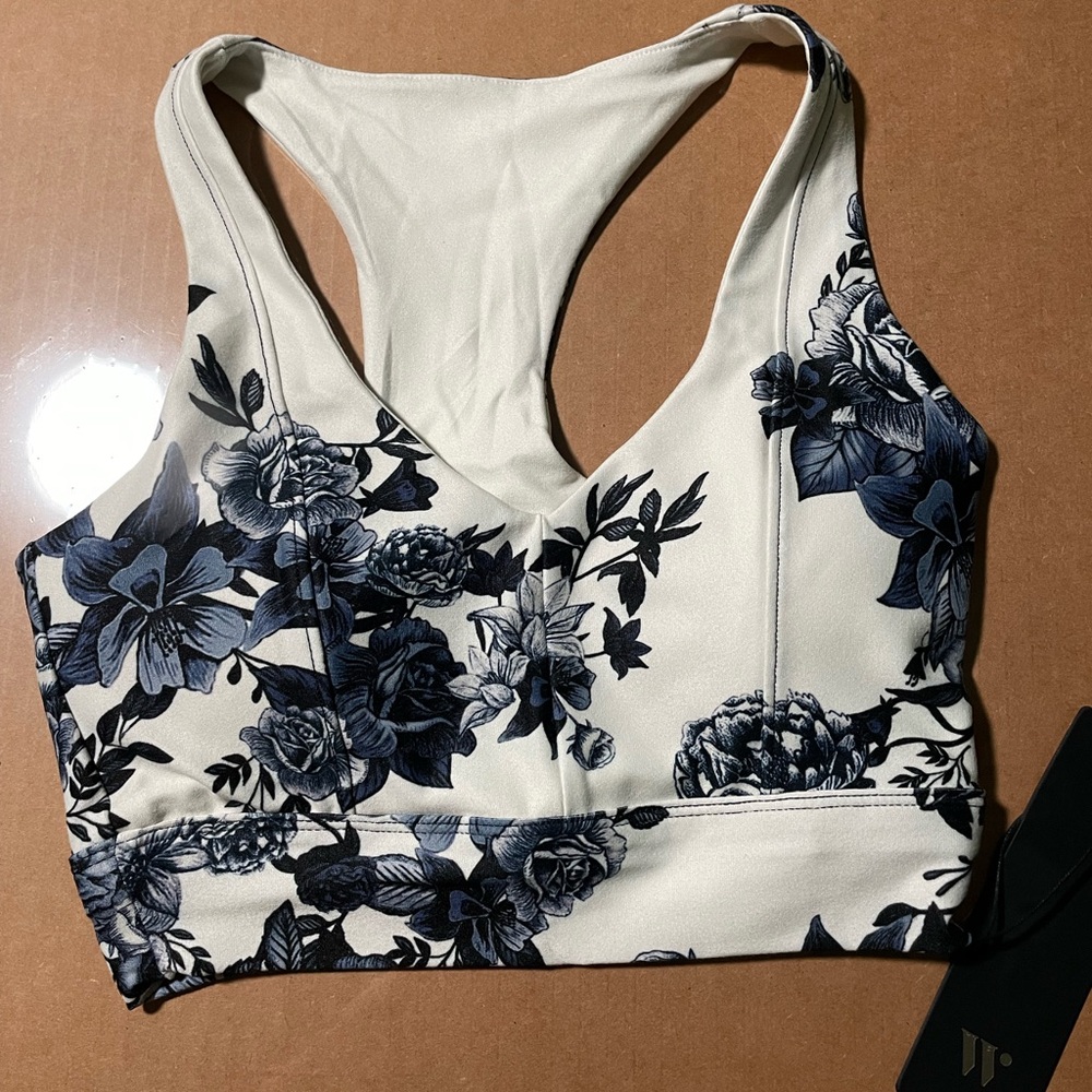 White and Blue Sports Bra with Elegant Design‎
